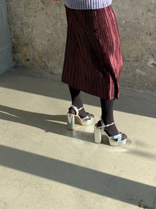 mirrored silver platform heels