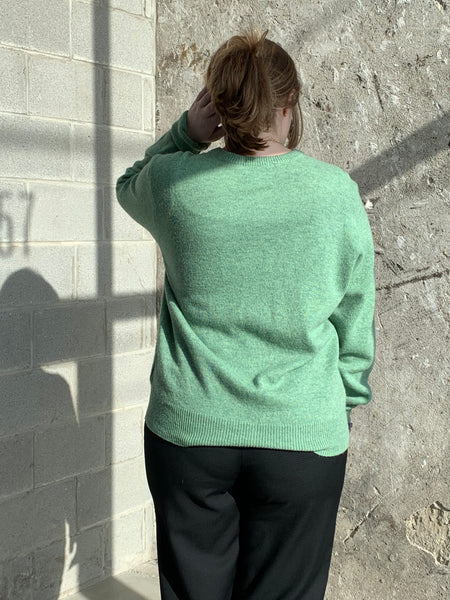 green wool sweater