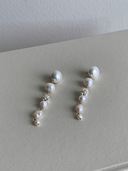 Completedworks long pearl earrings