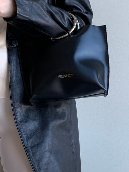 kohza numbers leather handbag