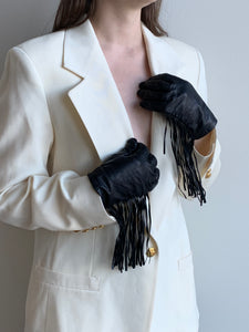 black leather gloves with fringe