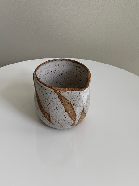 speckled ceramic saucer