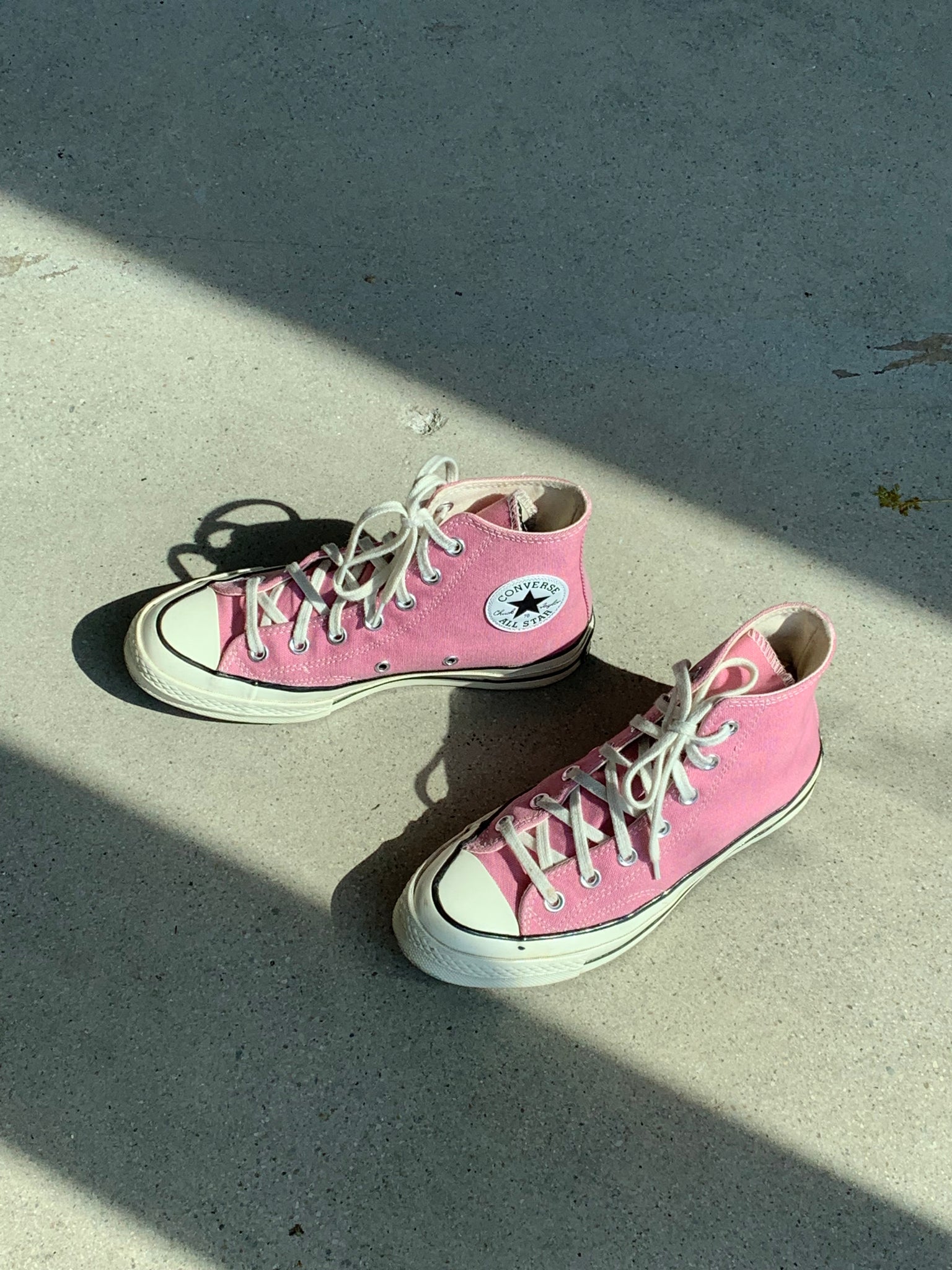 pink Converse high tops