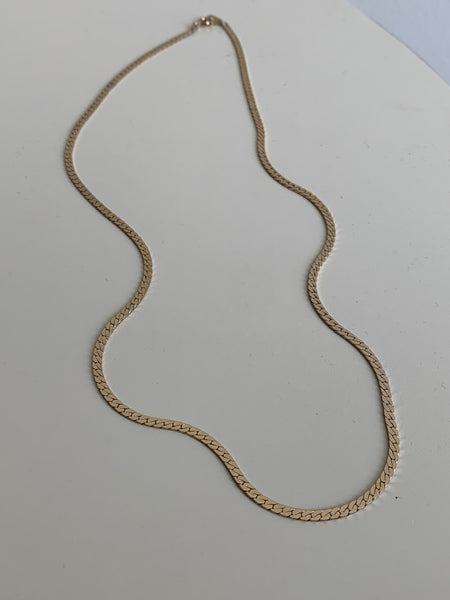 gold serpentine chain necklace